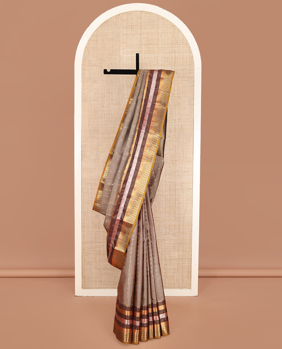 Grey Vasundhara Lite Silk Mix Saree, Elegantly Decked up with Zari Buttas on Its Body, Complemented by a Contrast Border of Muthu, Stripes, Yaali, and Mayil Designs, Intricately Designed Pallu, and Paired with a Contrast Blouse