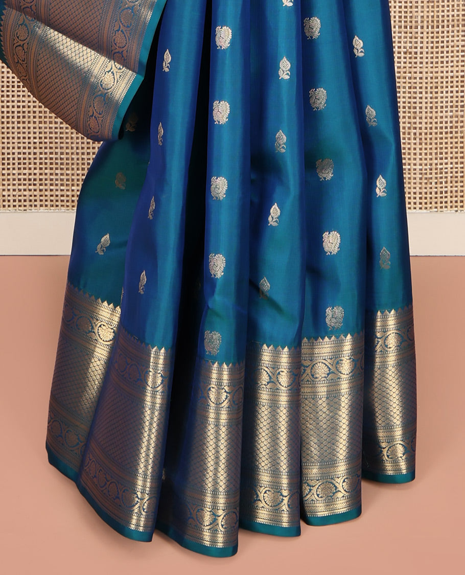 Blue Vasundhara Lite Silk Mix Saree, Graced with Zari Buttas All Over Its Body, Highlighted by a Zari Border of Rekku, Muthu, Kathir, Kodi Visiry, and Jaal Designs, Grand Jaal Pallu, and Paired with a Matching Blouse