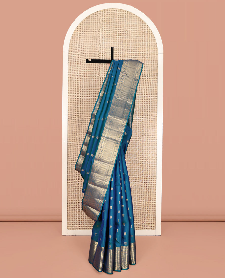 Blue Vasundhara Lite Silk Mix Saree, Graced with Zari Buttas All Over Its Body, Highlighted by a Zari Border of Rekku, Muthu, Kathir, Kodi Visiry, and Jaal Designs, Grand Jaal Pallu, and Paired with a Matching Blouse