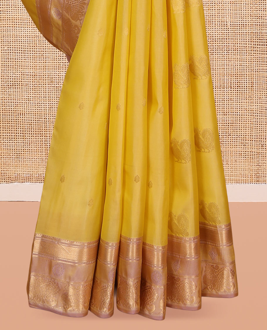 Yellow Vasundhara Lite Silk Mix Saree, Detailed with Mayil Buttas, a Contrast Mayil Border, an Intricate Pallu, and a Matching Blouse