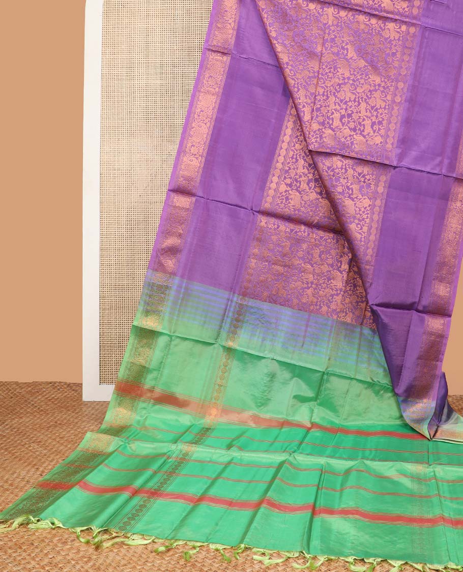 Purple jacquard banana pith saree with self floral, elephant design border & striped pallu