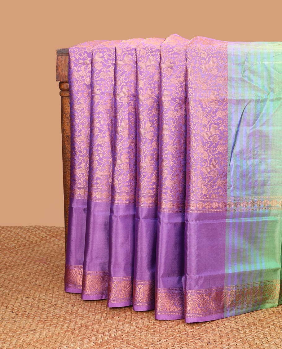 Purple jacquard banana pith saree with self floral, elephant design border & striped pallu