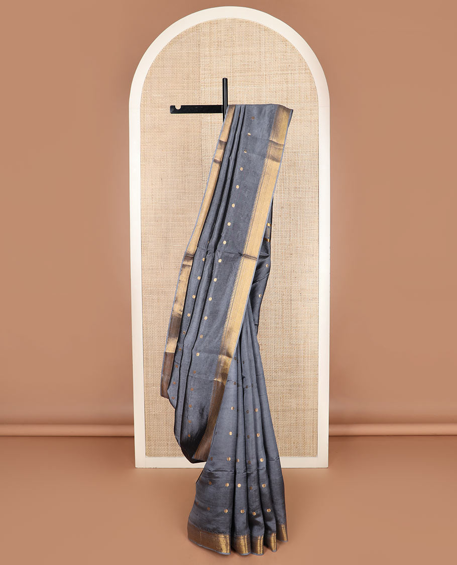 Grey buttas banana pith saree, zari temple border, and zari striped pallu