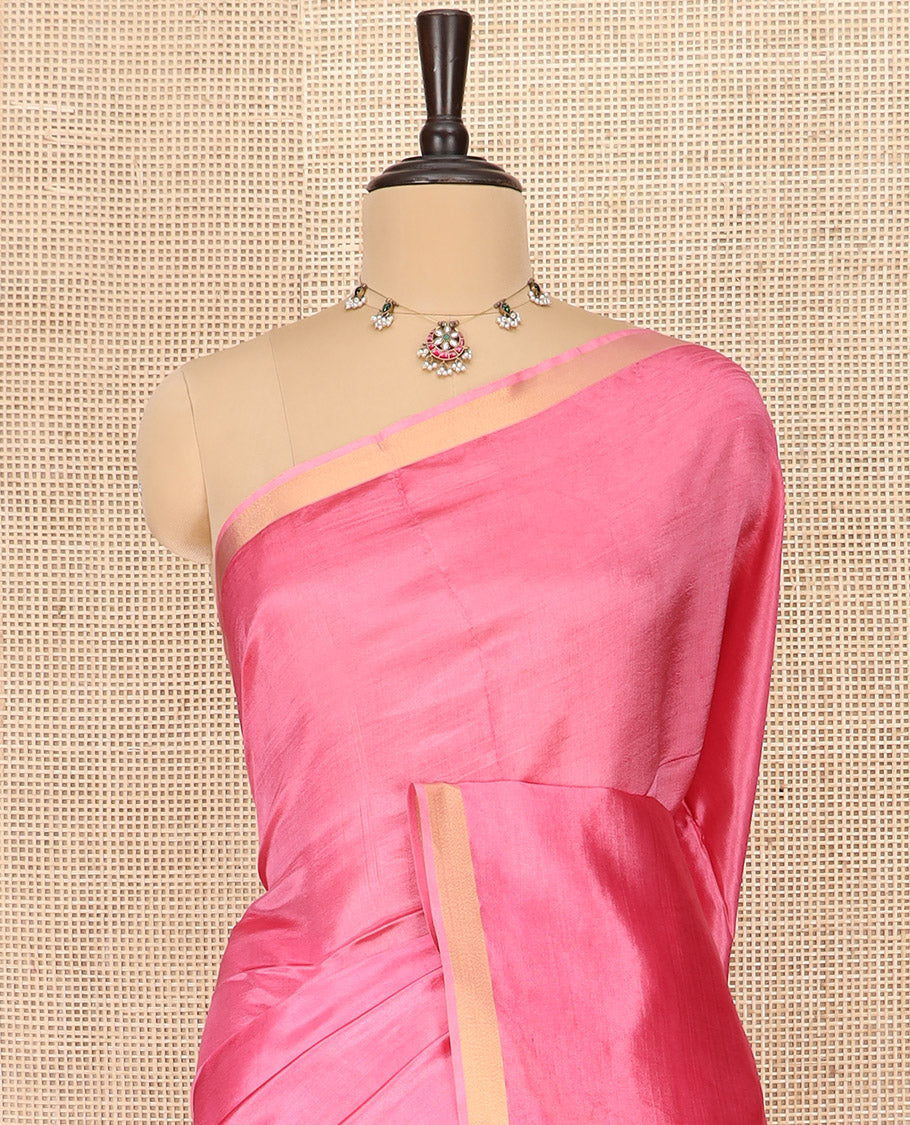 Pink Plain Banana Pith Saree Subtly Sparkled with Zari Bavanji Border, Gleaming Zari Stripes Woven Pallu, and Paired with a Matching Plain Blouse