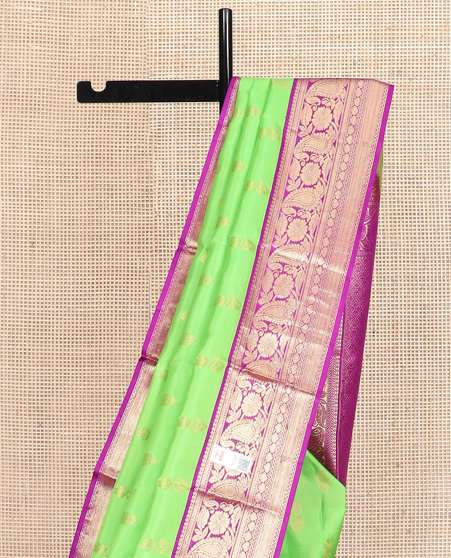Parrot green zari buttas silk saree, contrast border of thilakam mokku, kathir, floral, manga, thilakam, neli, and diamond designs, and jaal pallu