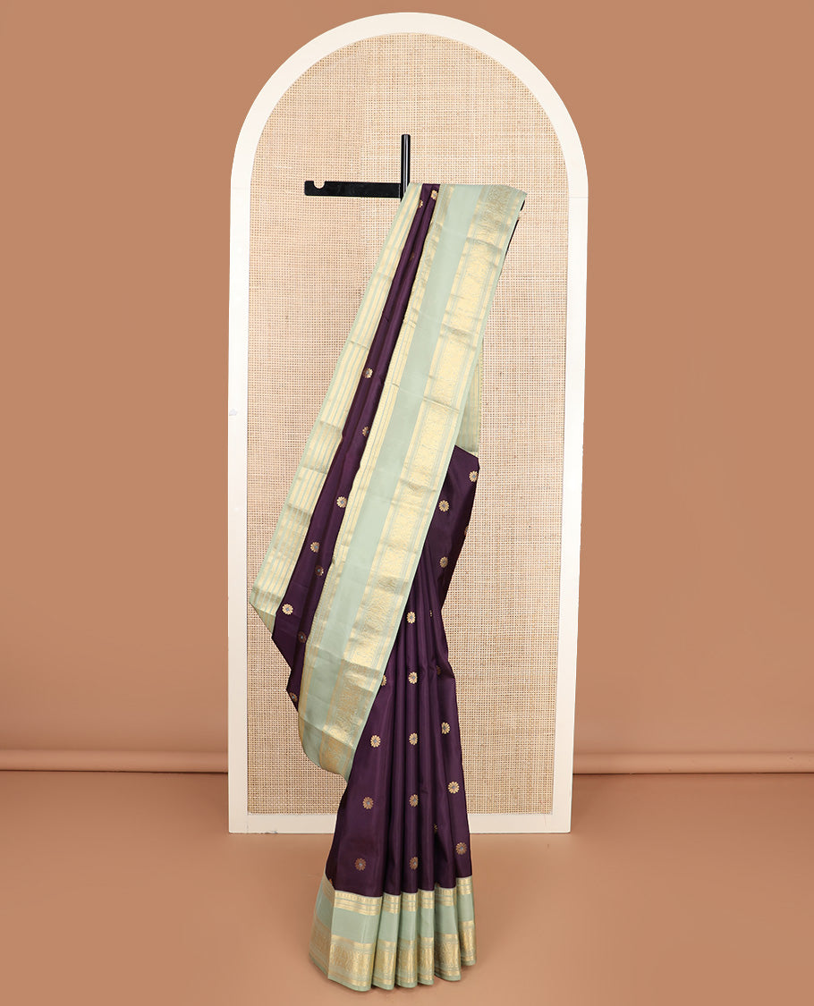 Purple meenakari kamalam buttas silk saree, contrast rettai pettu border of thilakam, neli, kathir, mayil, and yanaai designs, and intricate pallu