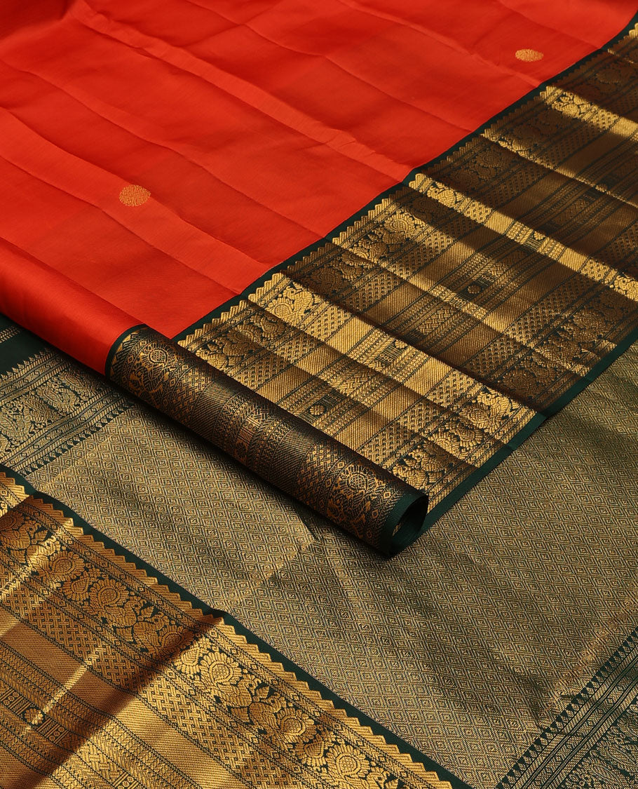 Orange zari buttas silk saree, contrast jaal pallu & border of rekku,banaras,mayil,paiyaadi kattam & kamalam designs