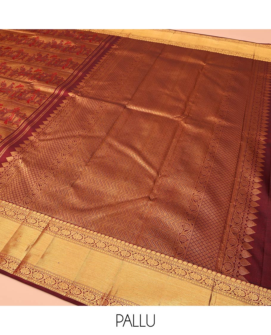 Maroon Kanchipuram Wedding Silk Saree, Gracefully Embellished with King and Queen Wedding Theme Jacquard Weave, Highlighted by Zari Border of Manga Mokku, and Kodi Visiry Designs, Chevron Striped Pallu and Paired with a Matching Blouse