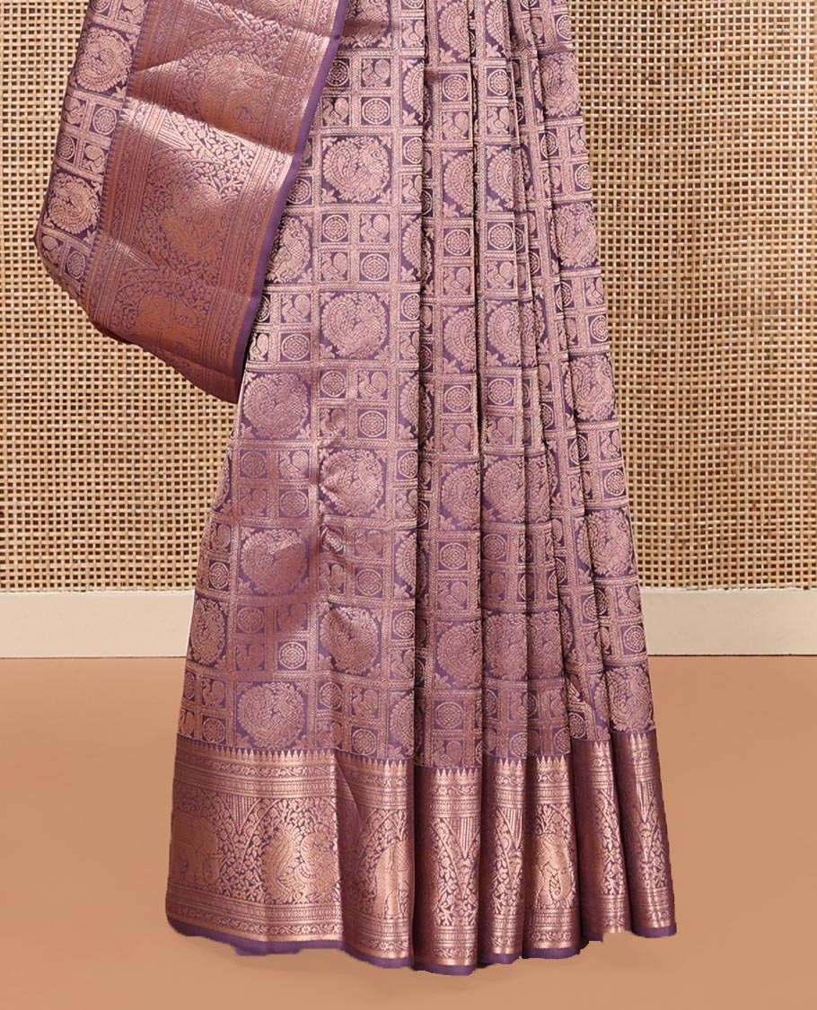 Purple Kanchipuram Wedding Silk Saree, Beautifully Bedecked with Mayil-Chakram Jacquard on Its Body, Highlighted by a Zari Border of Thilakam Mokku, Kodi Visiry, Annam, and Yaanai Designs, Intricately Designed Pallu, and Paired with a Matching Blouse