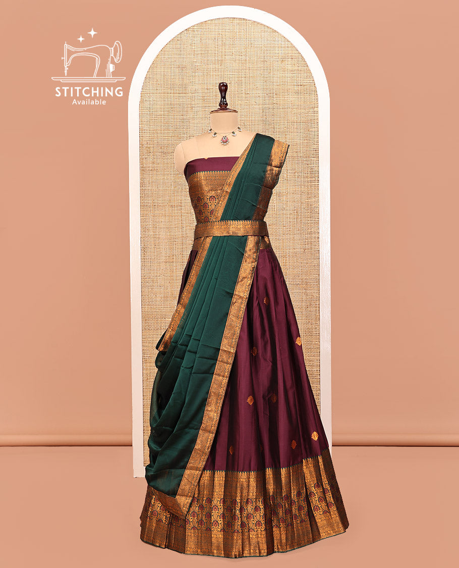Maroon Art Silk Half Saree Features Buttas Steeped Skirt, Complemented by Contrast Traditional Border, Matching Blouse, and a Plain Zari-Bordered Dhavani