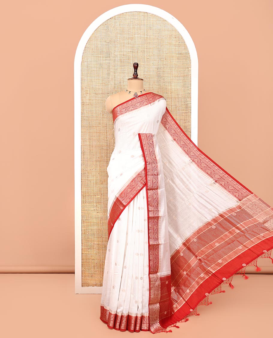 White Assam Silk Saree, Enthralled with Buttas, Complemented by Contrast Floral Design Border, Zari-Design Pallu, and a Contrast Blouse