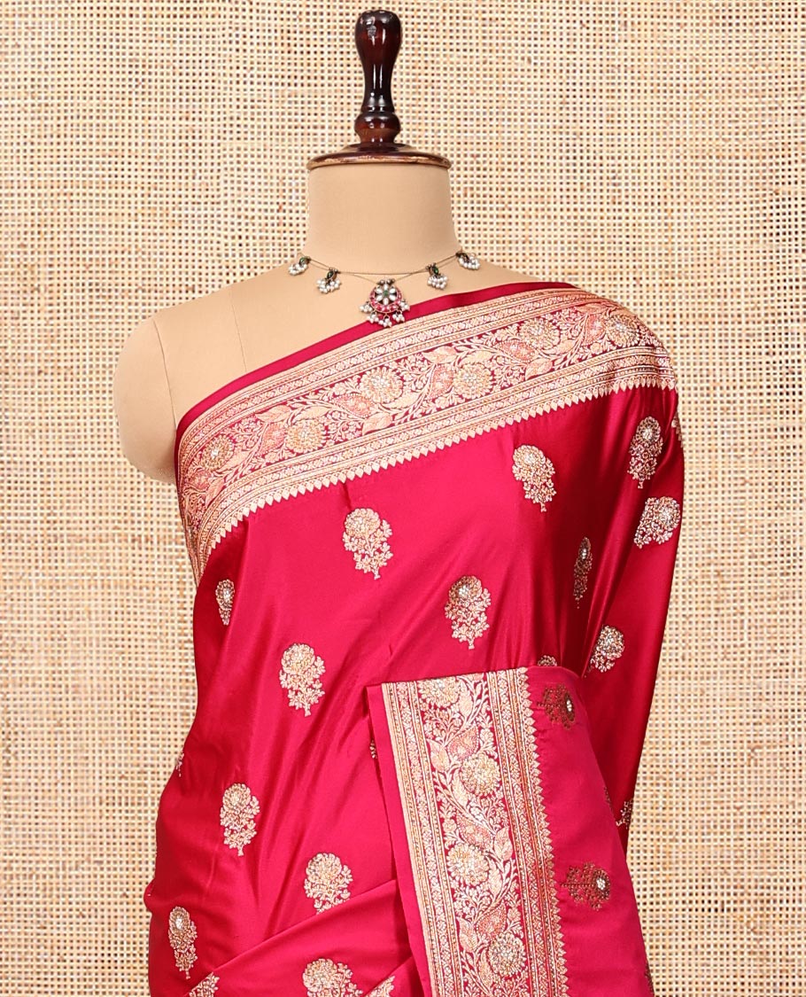Red Banarasi Satin Saree, Spotlighted with Floral Buttas, a Floral Creeper Border, Intricate Stonework Pallu, and a Matching Blouse
