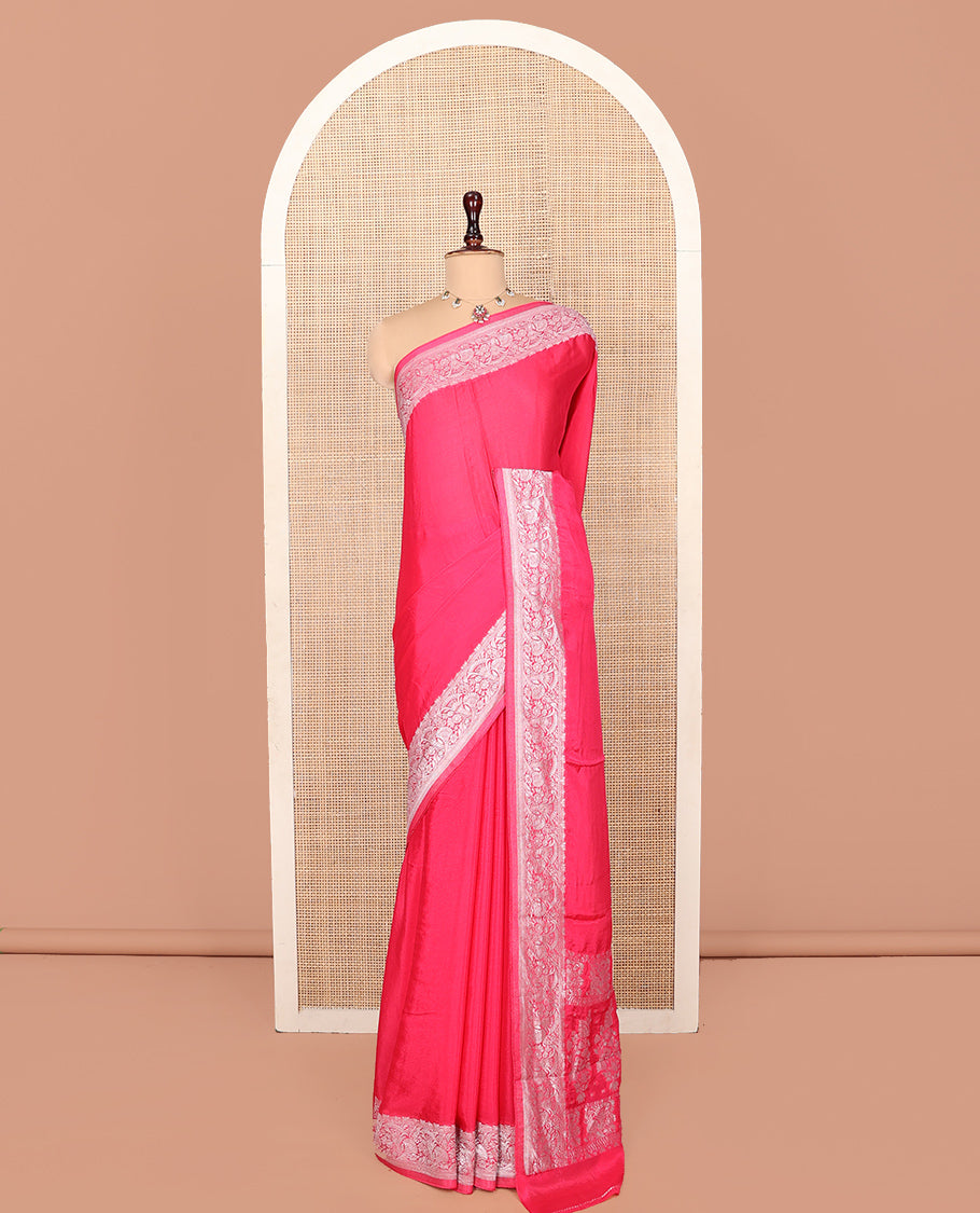 Pink Plain Fancy Crepe Saree, Highlighted by a Floral Border, Intricately Designed Pallu, and a Matching Blouse