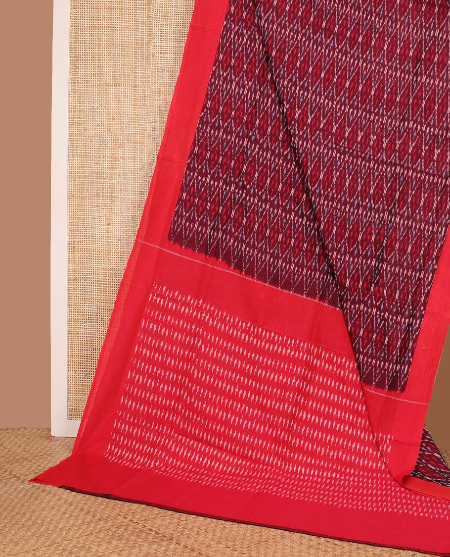 Maroon ogee patterned ikkat cotton saree, contrast plain border, and pallu of buttas