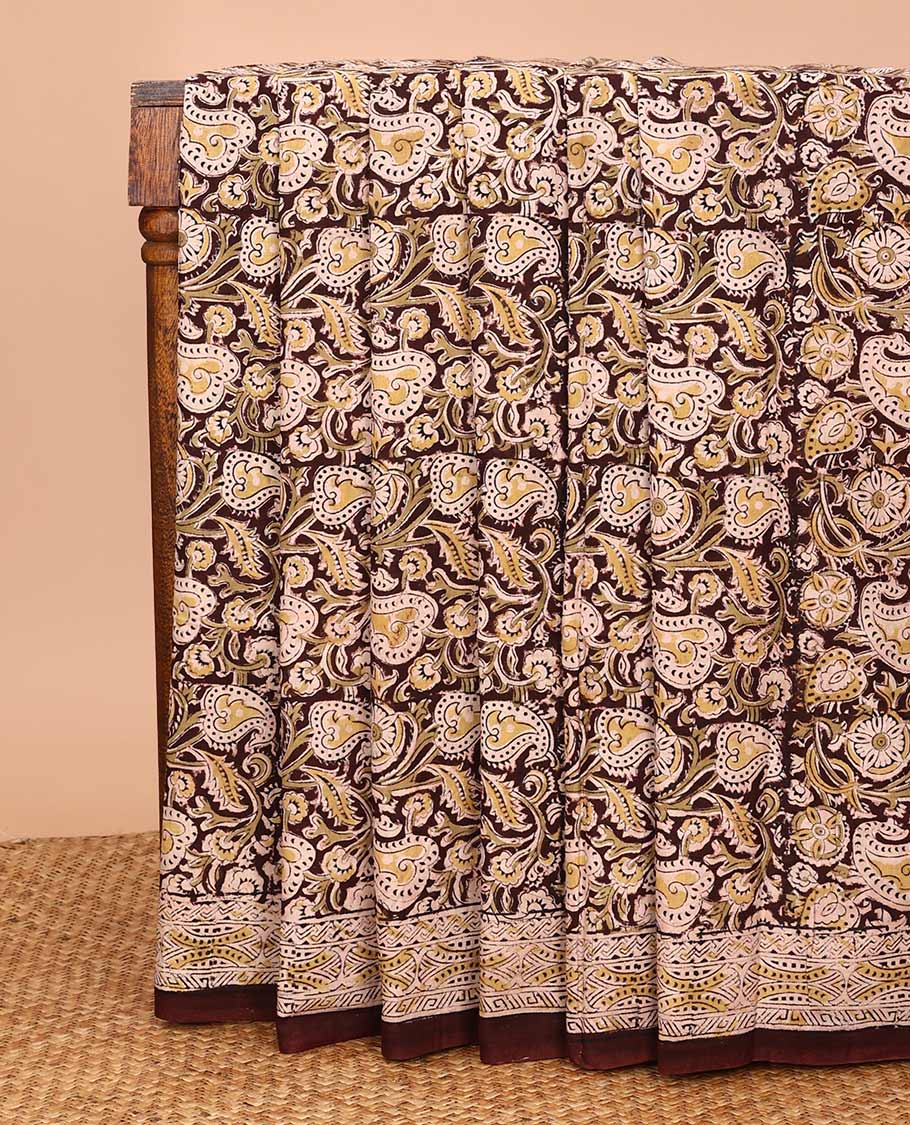 Brown leaf vine machine-printed Kalamkari cotton saree, geometric printed border, and pallu of floral print