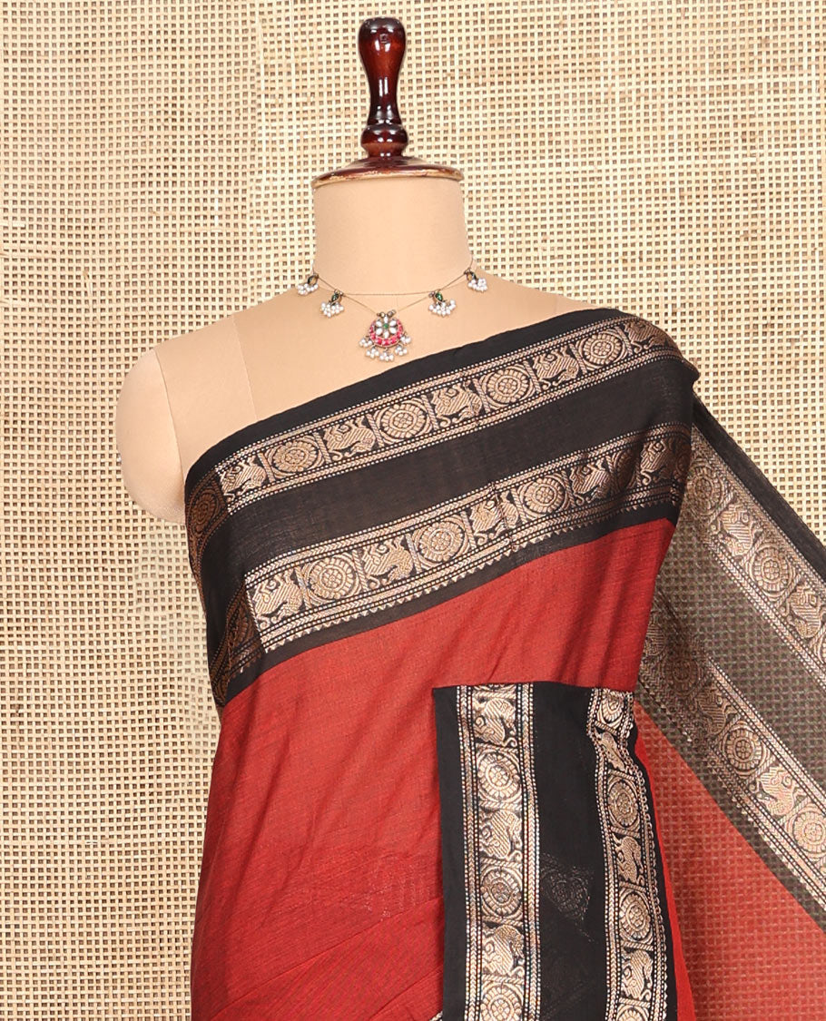 Brick Red Plain Chettinad Cotton Saree, Complemented by a Contrast Yaali-Chakram Zari Border, Striped Pallu, and a Matching Blouse