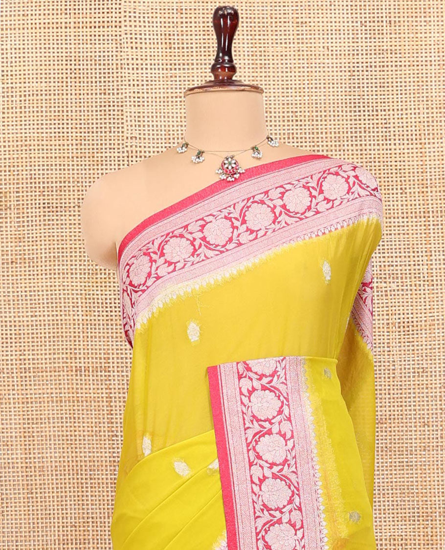 Mustard Banarasi Georgette Saree, Ornamented with Zari Buttas All Over Its Body, Complemented by a Contrast Floral Creeper Design Border, Pallu of Paisleys, and Paired with a Contrast Blouse