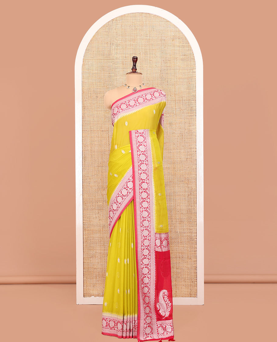 Mustard Banarasi Georgette Saree, Ornamented with Zari Buttas All Over Its Body, Complemented by a Contrast Floral Creeper Design Border, Pallu of Paisleys, and Paired with a Contrast Blouse