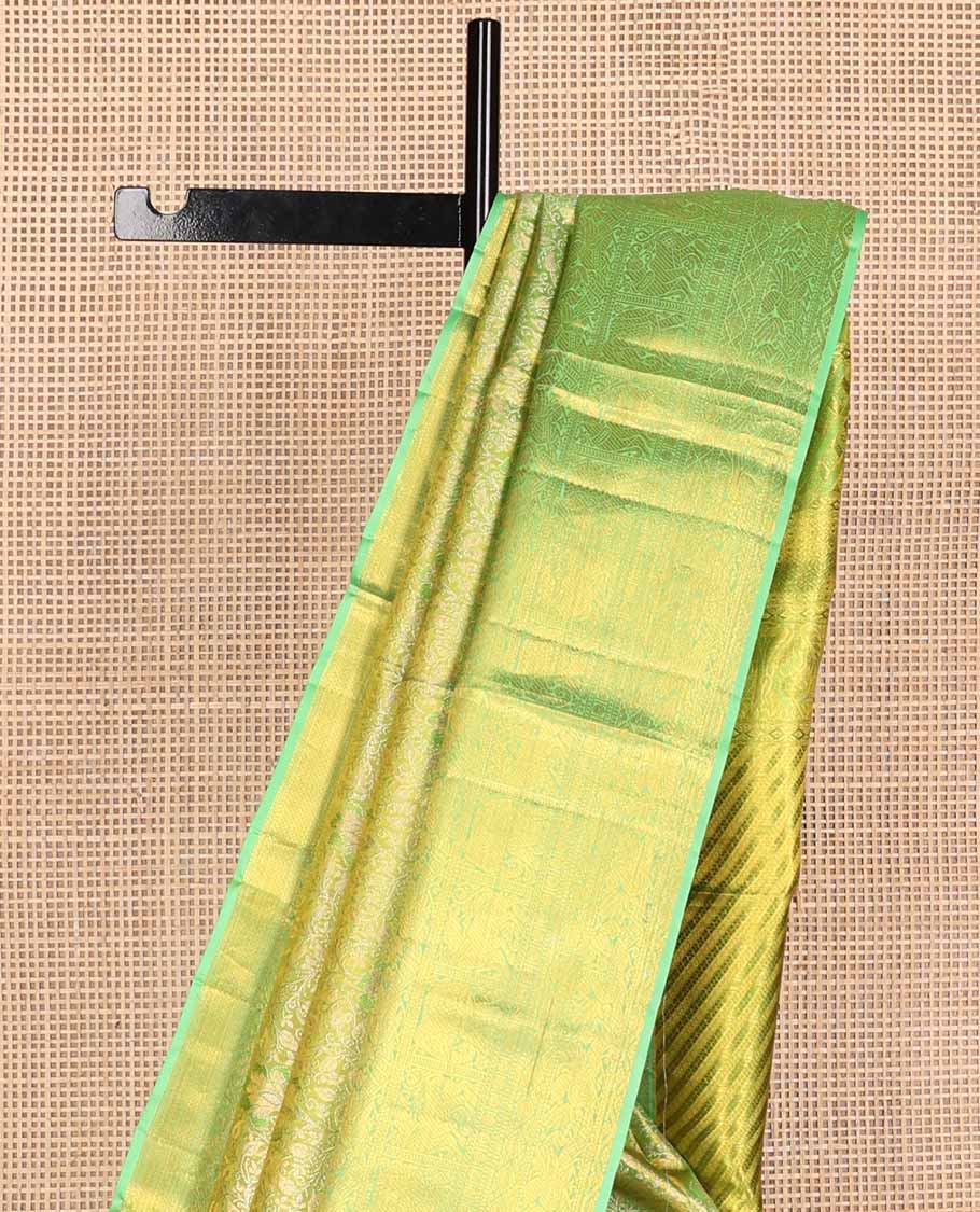 Green jacquard tissue silk saree, striped pallu & zari border of ogee,kathir,mayil,yaanai,yaali & rudraksham