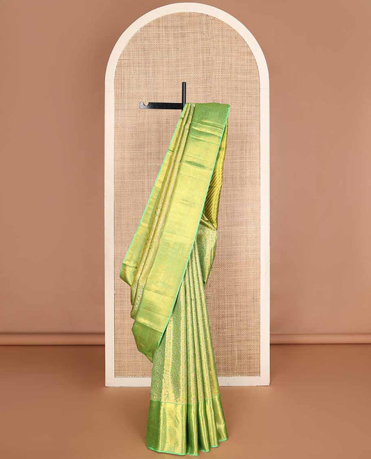 Green jacquard tissue silk saree, striped pallu & zari border of ogee,kathir,mayil,yaanai,yaali & rudraksham