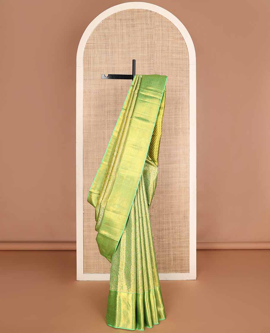 Green jacquard tissue silk saree, striped pallu & zari border of ogee,kathir,mayil,yaanai,yaali & rudraksham
