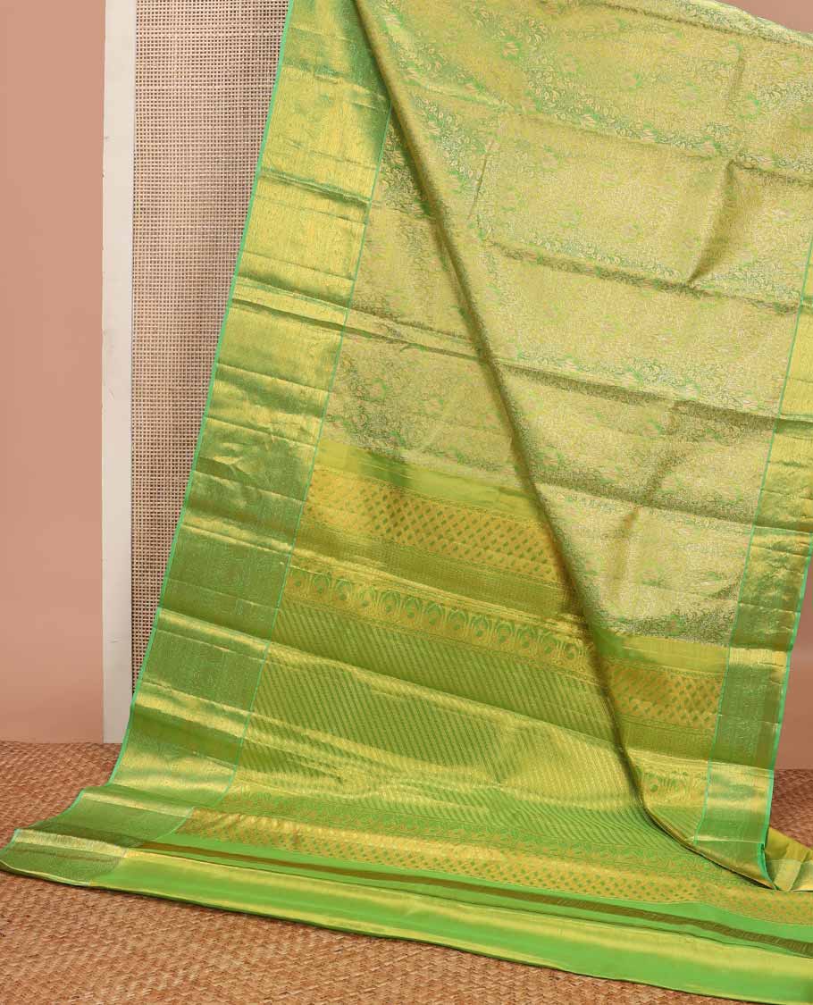 Green jacquard tissue silk saree, striped pallu & zari border of ogee,kathir,mayil,yaanai,yaali & rudraksham