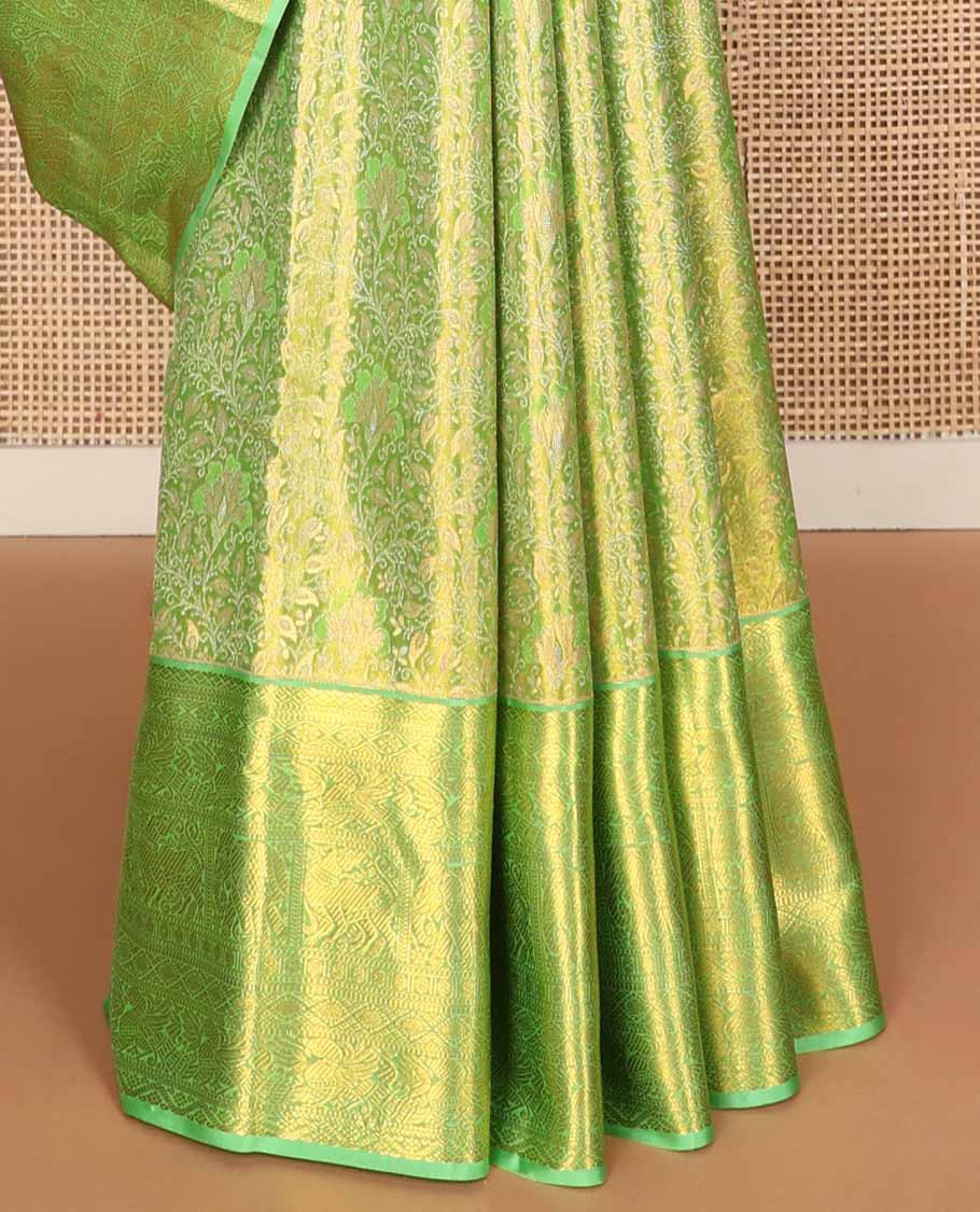 Green jacquard tissue silk saree, striped pallu & zari border of ogee,kathir,mayil,yaanai,yaali & rudraksham