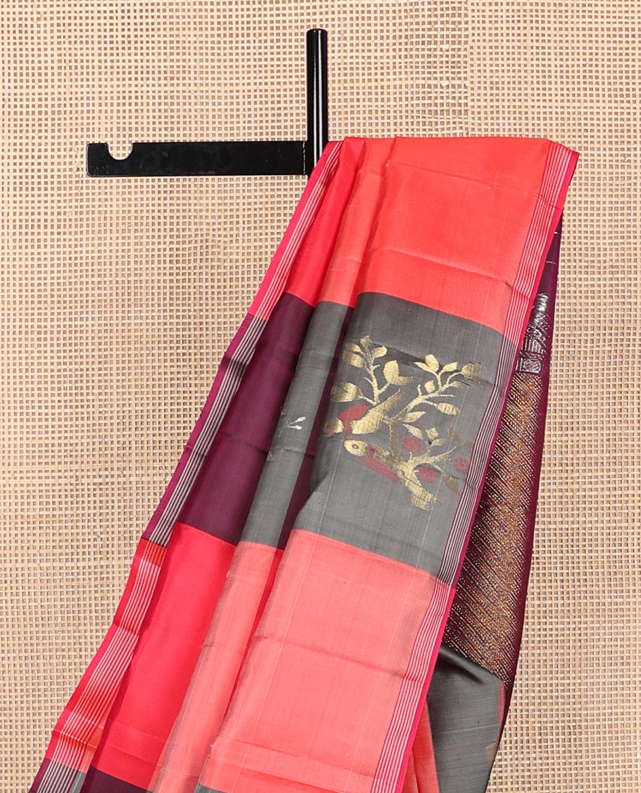 Multi-colored bird buttas enclosed checked Kanchipuram silk saree, striped piping border, and zari-rich pallu