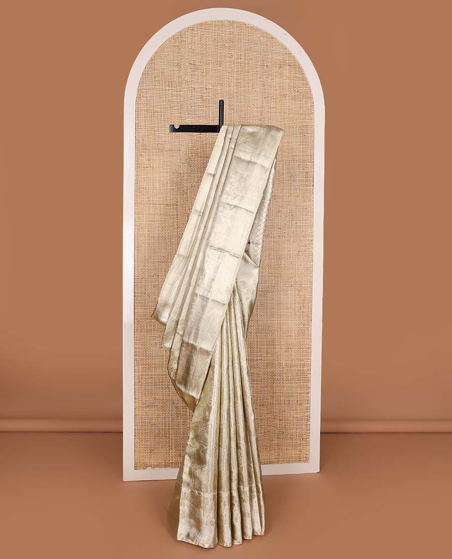 Gold jacquard Kanchipuram silk saree, wedding-theme border, and jaal pallu