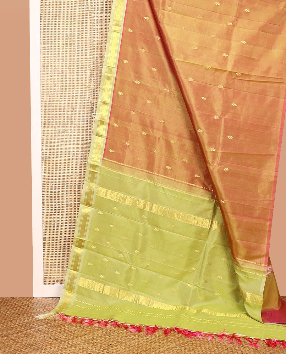 Orange Kanchipuram Silk Saree, Detailed with Zari Buttas All Over Its Body, Complemented by a Contrast One-Sided Border of Banaras, and Jaal Designs, Pallu of Zari Designs, and Comes Without a Blouse