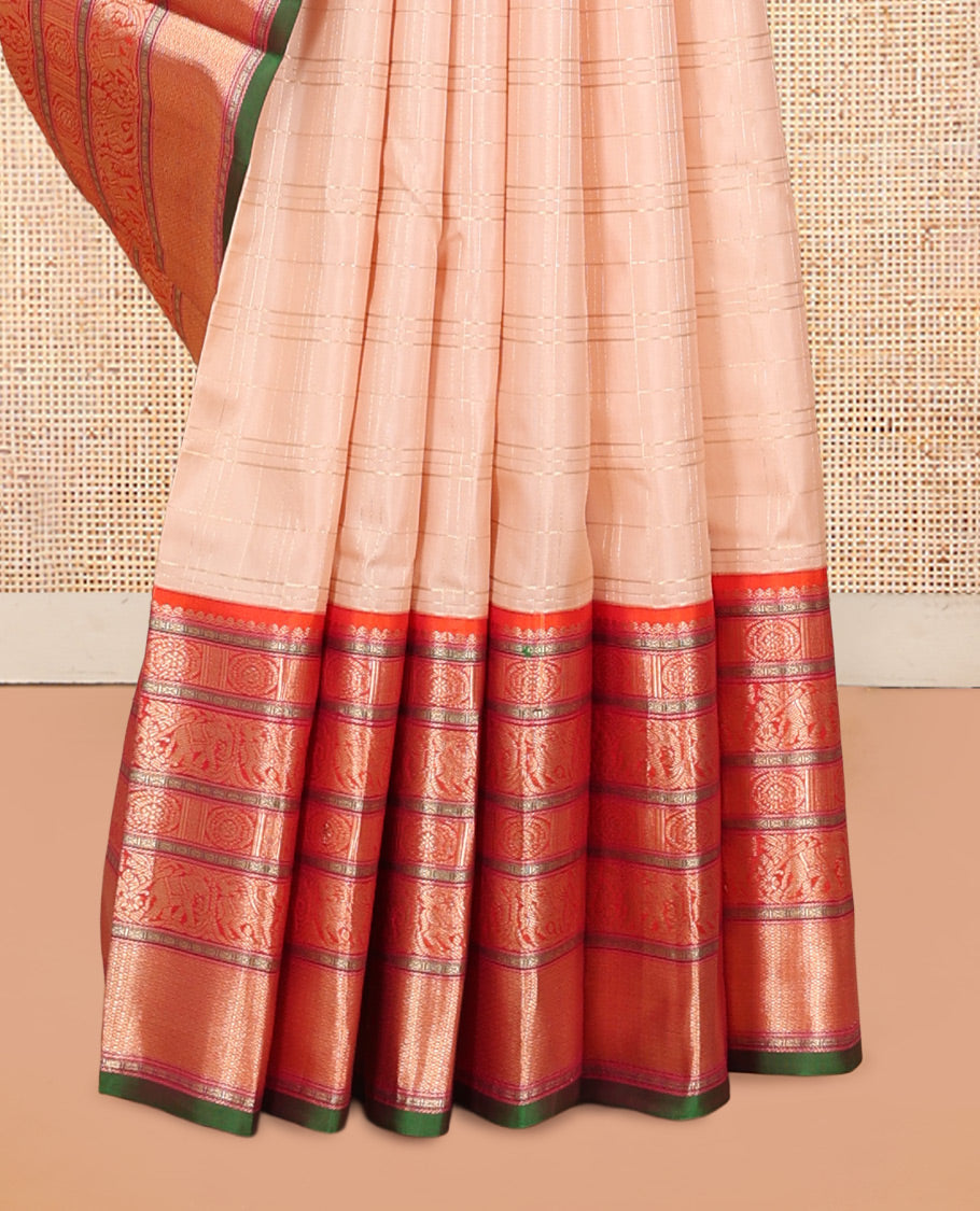 Sandal Vasundhara Silk Saree Subtly Sparkled with Zari Checks, Complemented by a Contrast Border of Thilakam Mokku, Chakram, Kodi Yaanai, Kuthirai, and Mayil Kann, Intricately Designed Pallu, and Paired with a Contrast Blouse