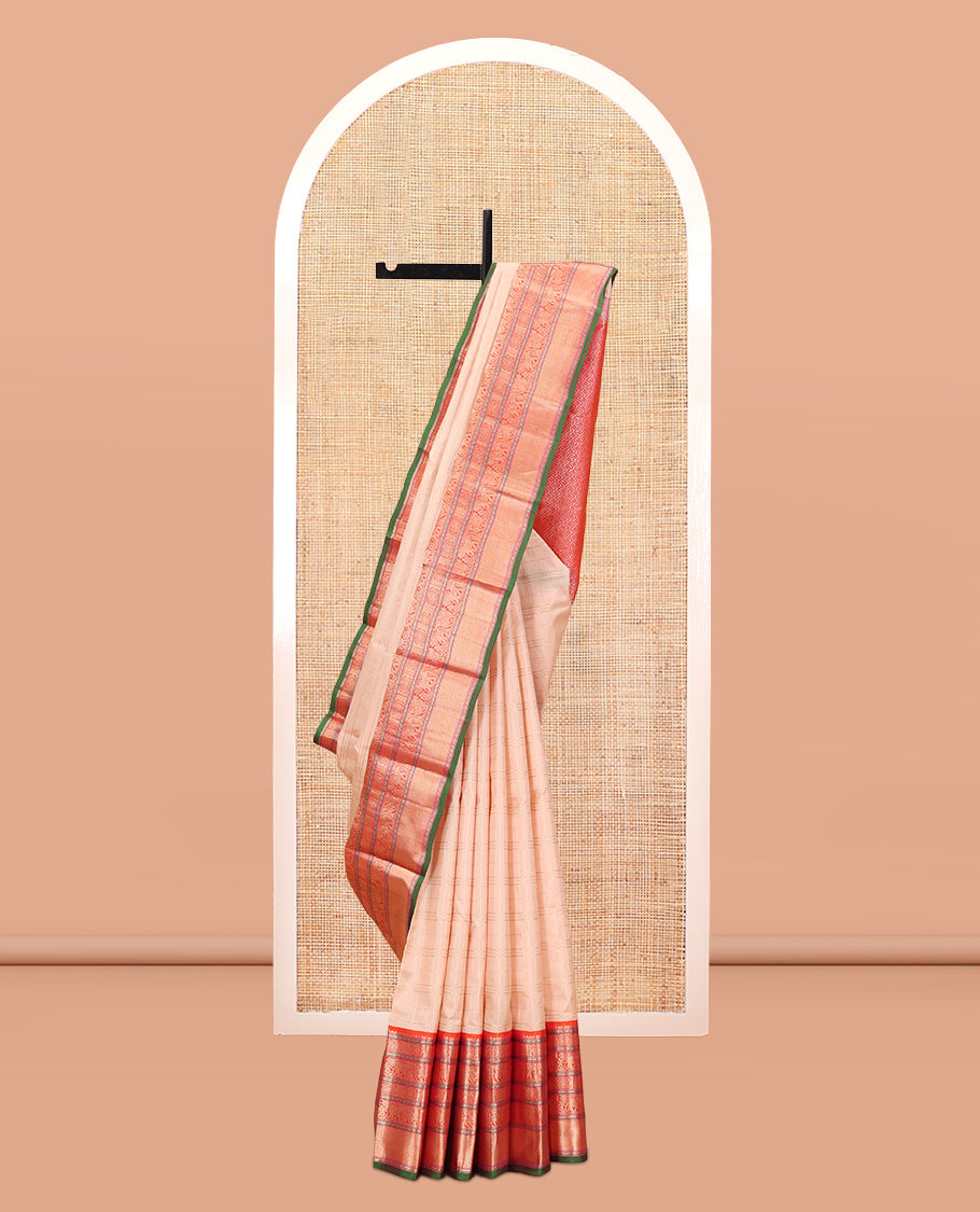 Sandal Vasundhara Silk Saree Subtly Sparkled with Zari Checks, Complemented by a Contrast Border of Thilakam Mokku, Chakram, Kodi Yaanai, Kuthirai, and Mayil Kann, Intricately Designed Pallu, and Paired with a Contrast Blouse