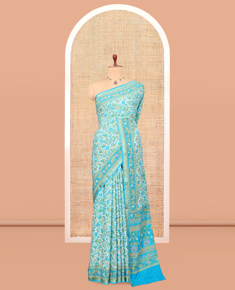 Blue Printed Silk Saree, Detailed with Floral Vine Print, a Zari Floral Printed Border, Floral Print Pallu, and a Matching Blouse