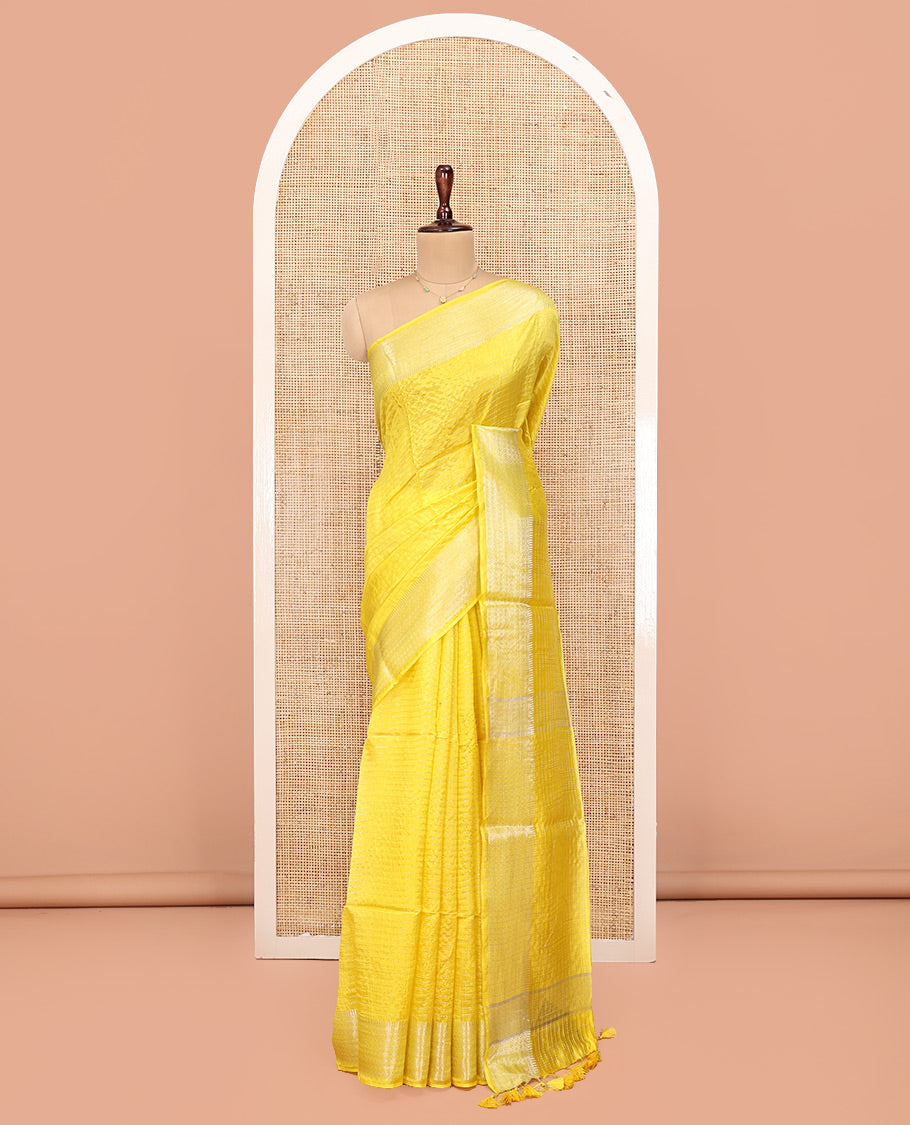 Yellow Banana Pith Saree, Subtly Sparkled with Zari Stripes All Over Its Body, Subtly Woven Border, Subtly Striped Pallu, and Paired with a Matching Blouse