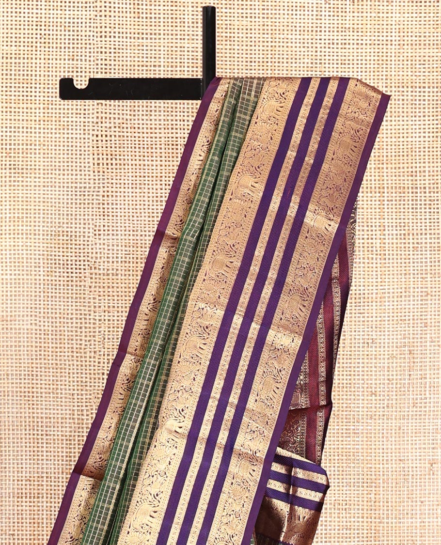 Green Vasundhara Silk Saree, Meticulously Crafted with Zari Butta Enclosed Checks All Over Its Body, Complemented by a Contrast Border of Mayil, Kuthirai, and Yaanai Designs, Grand Jaal Pallu, and Paired with a Contrast Blouse