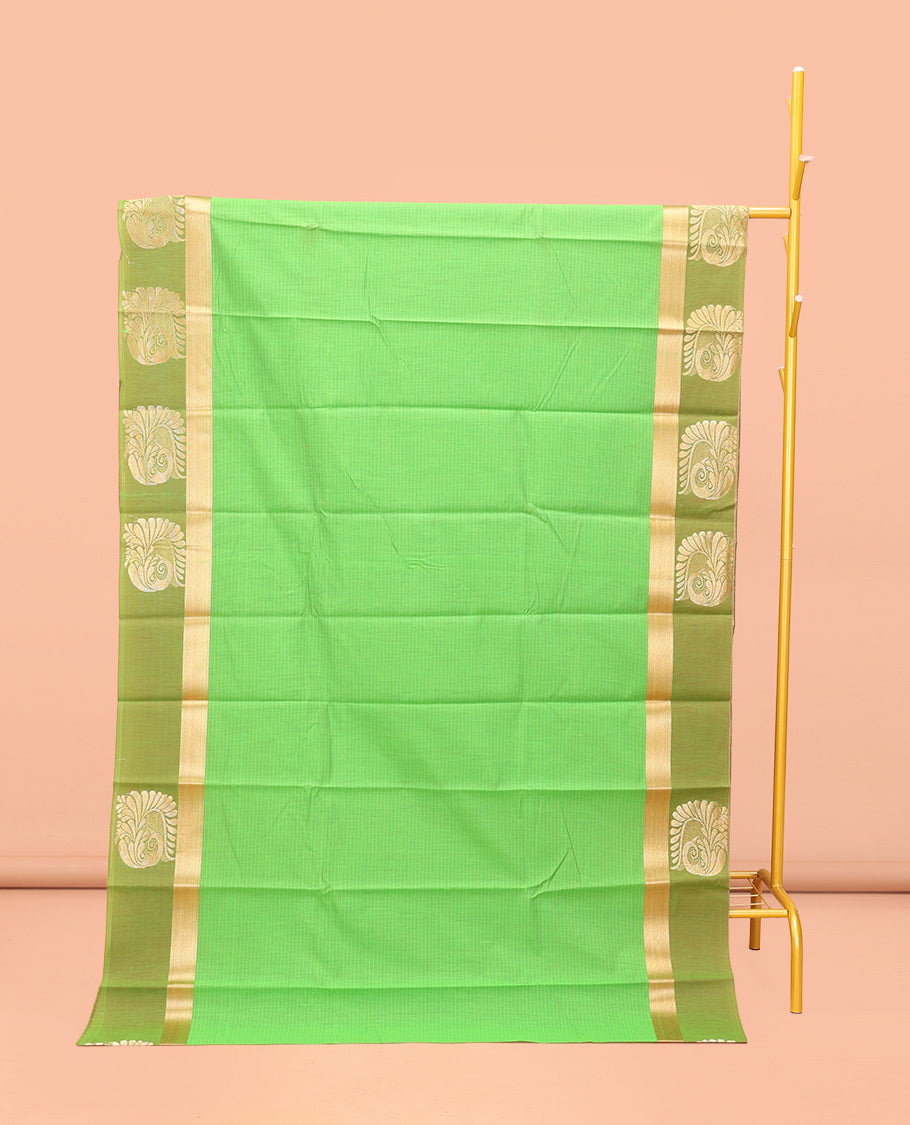Green Semi-Silk Cotton Saree, Subtly Sparkled with Stripes All Over Its Body, Complemented by a Contrast Zari Buttas Woven Border, Pallu of Bird and Paisley Designs, and Paired with a Matching Blouse