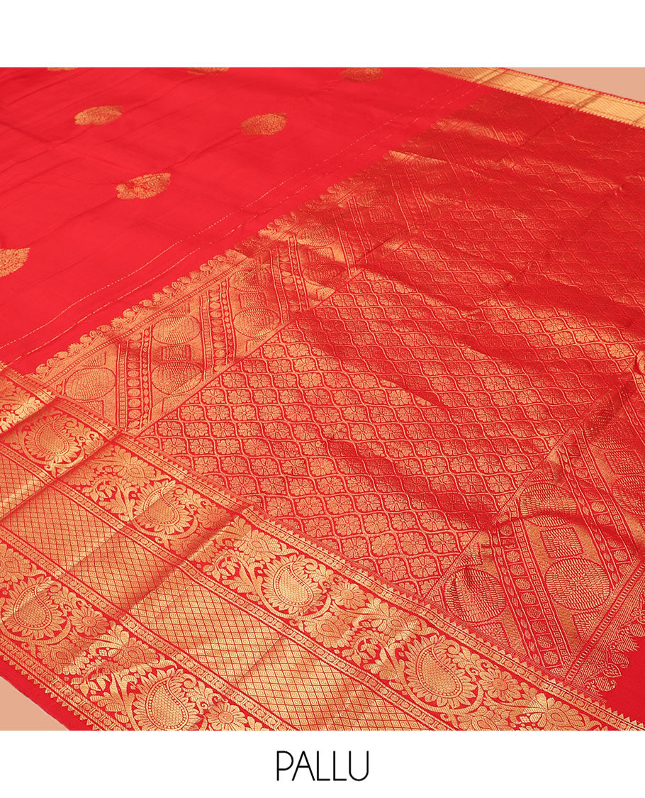 Red Kanchipuram Silk Saree, Spotlighted with Zari Buttas, Highlighted by Zari Border of Rekku, Rudraksham, Paisley Vine and Jaal Designs, Jaal Pallu, and a Matching Blouse