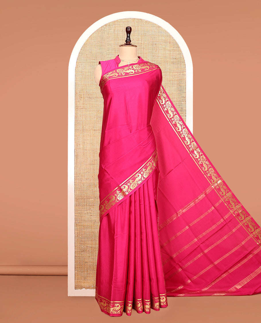 Pink Plain Mysore Silk Saree, Highlighted by a Traditional Zari Border of Peacock Designs, Pallu Steeped with Zari Stripes, and Paired with a Matching Blouse