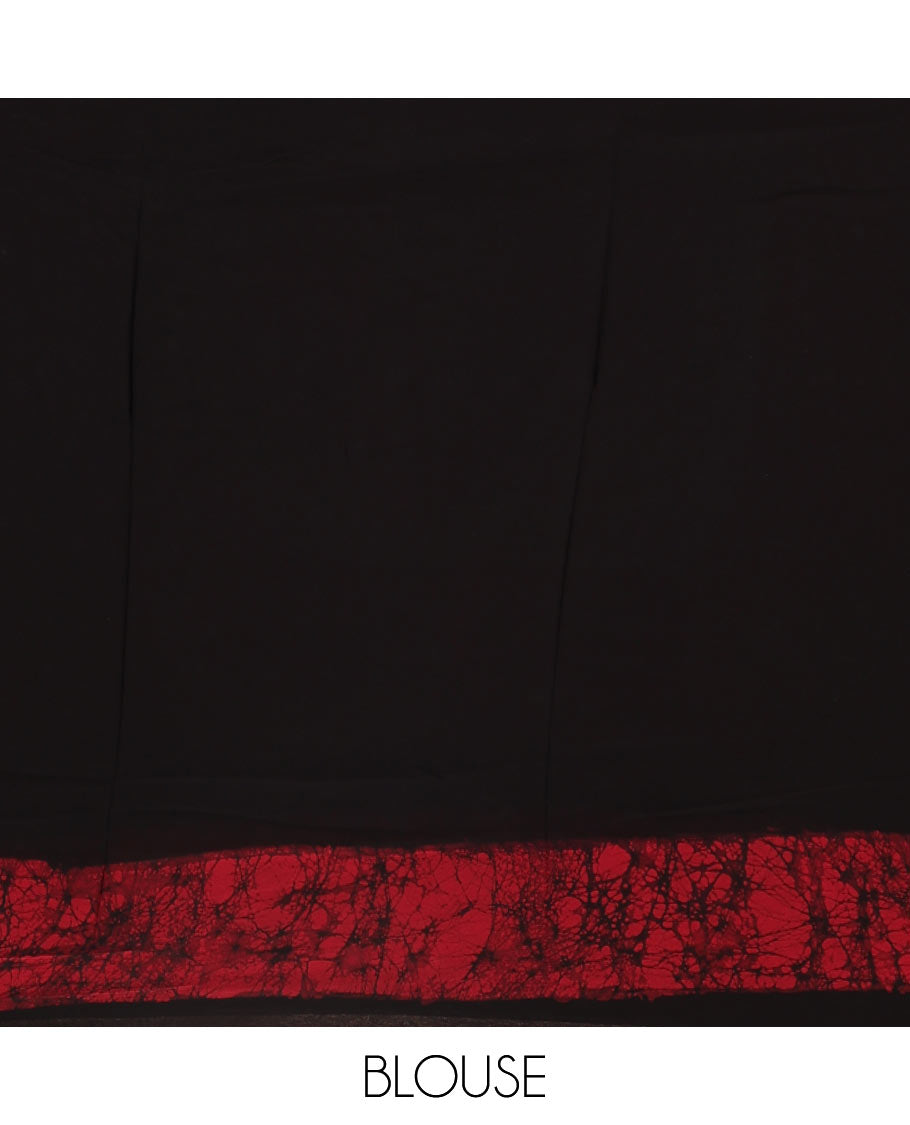 Black and rani pink plain georgette saree, batik printed border, batik printed checked pallu, and a matching blouse