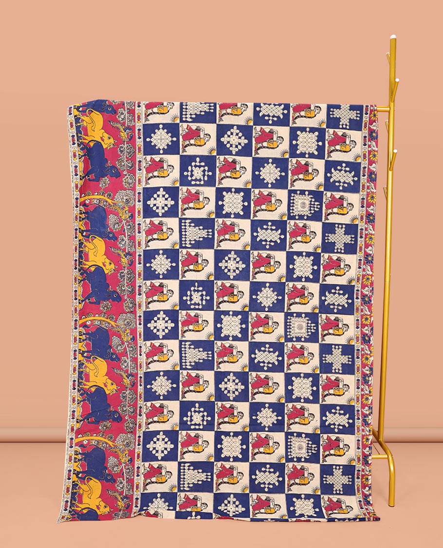 Multi-Color Machine-Printed Kalamkari Cotton Saree, Artfully Printed with Kolam and Human Motif Enclosed Checks on Its Body, Complemented by a Contrast Pichwai Cow Printed Border, Pallu of Floral Vine Print, and Paired with a Printed Blouse