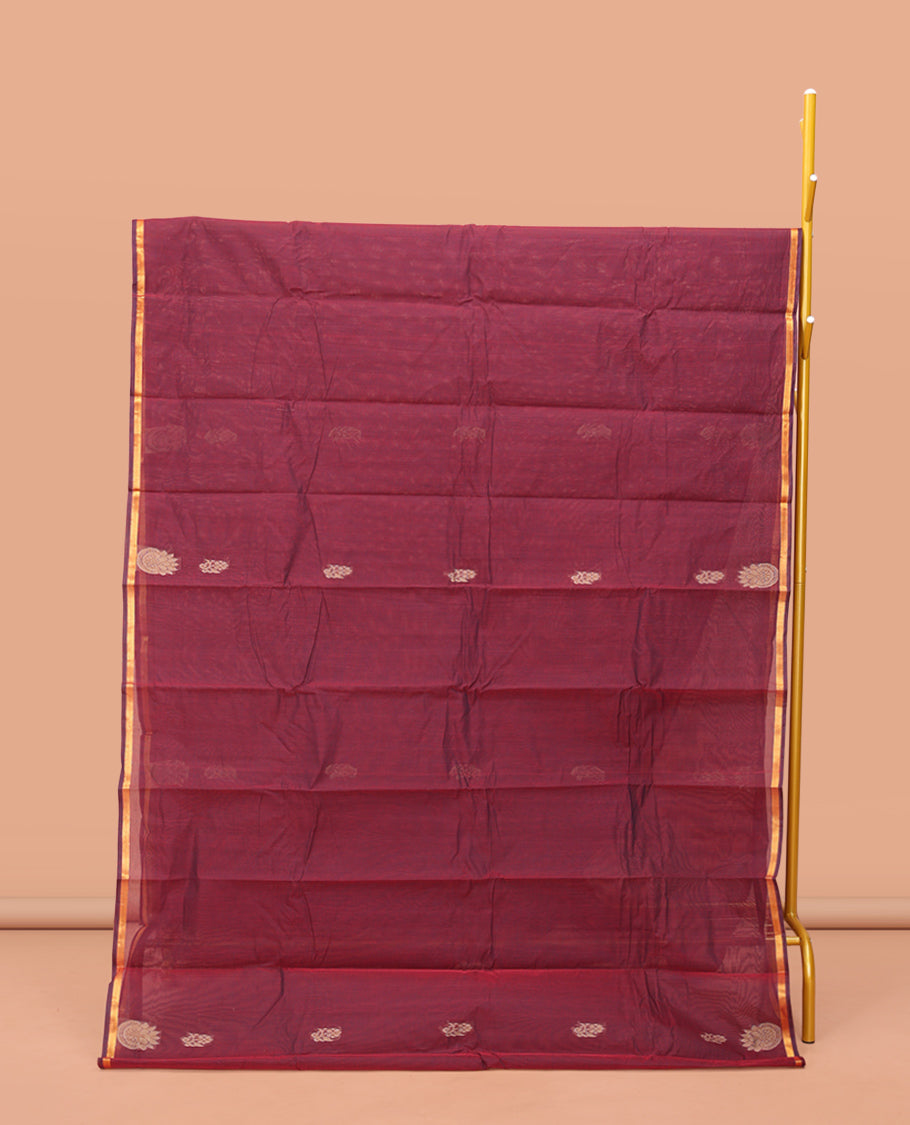 Wine Kanchi Cotton Saree, Elevated with Buttas on Its Body, a Subtle Border, Intricately Designed Pallu, and a Matching Blouse