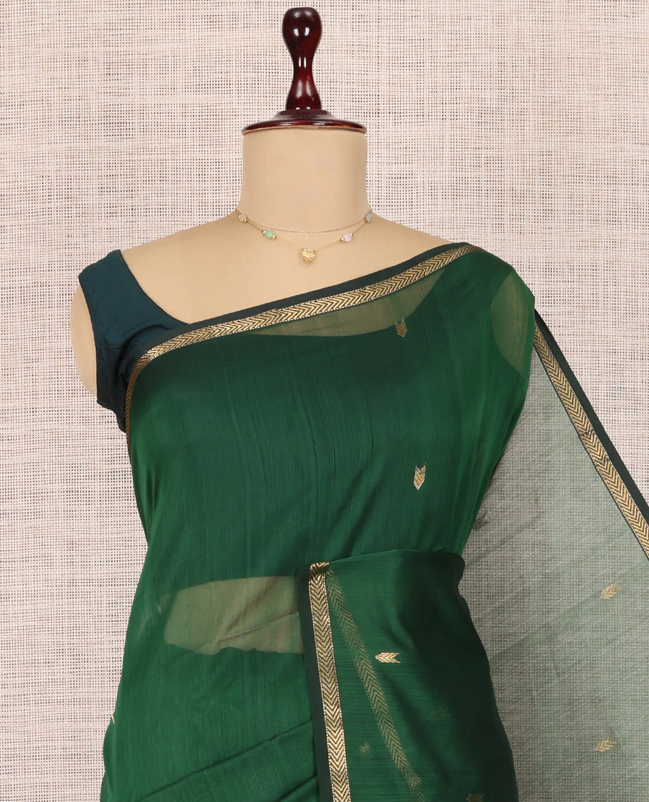 Green Maheshwari Cotton Saree, Adorned with Buttas, Highlighted by a Zari Piping Border, Pallu of Zari Buttas, and Matching Blouse