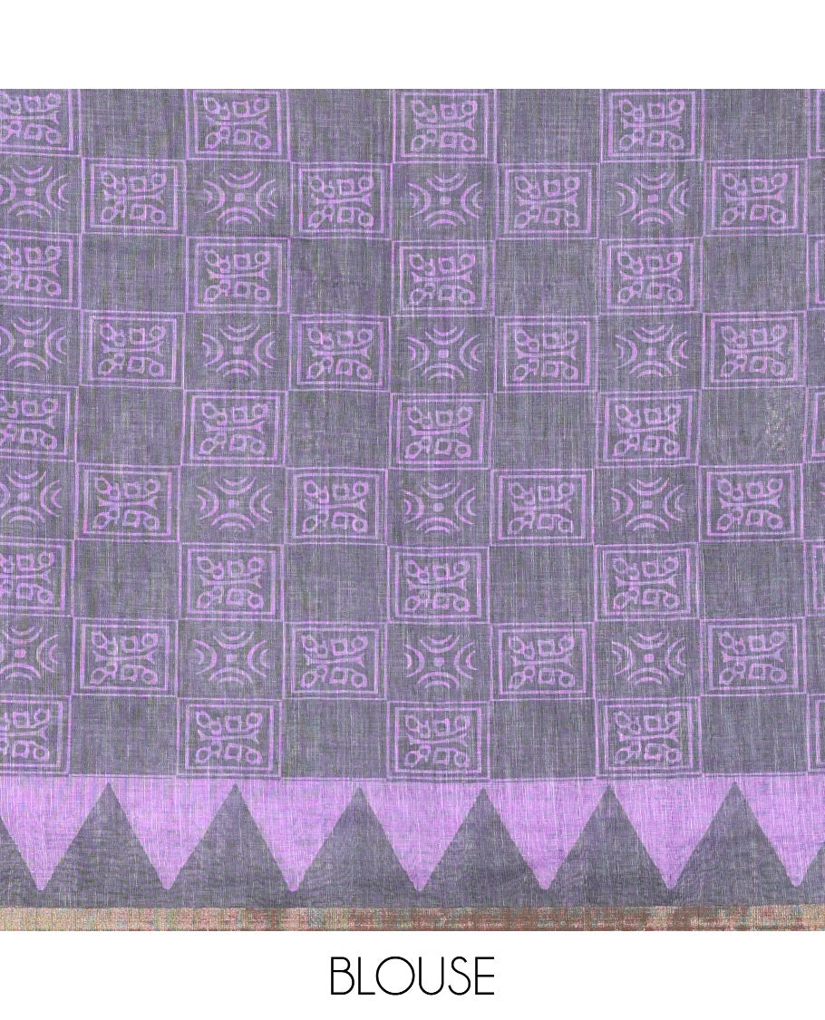 Lavender vertical stripes printed linen cotton saree, a temple-printed border, big polka dot printed pallu, and a printed blouse