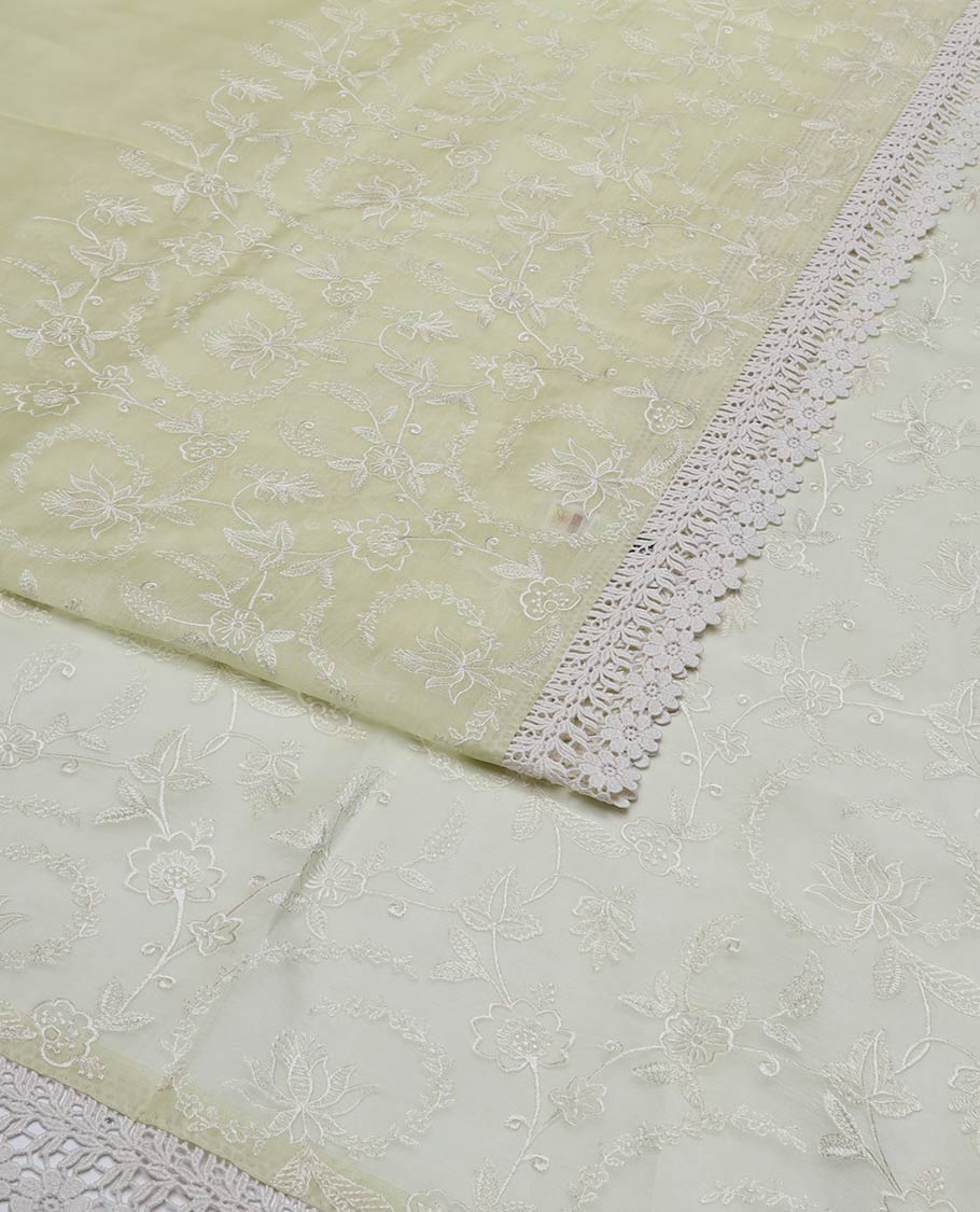 Lemon yellow floral design organza saree with lace border