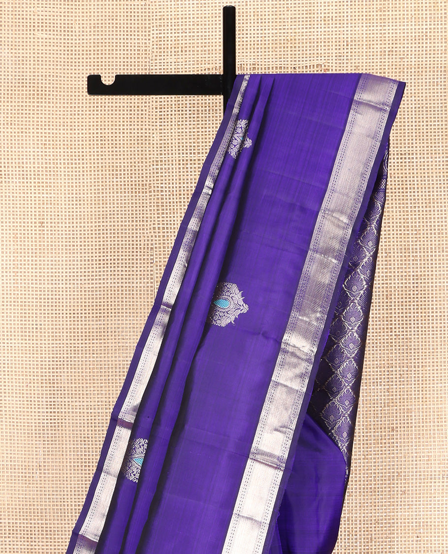 Violet Kanchipuram Silk Saree, Embellished with Zari Buttas All Over Its Body, Highlighted by Zari Border of Muthu and Neli Designs, Grand Pallu, and Paired with a Matching Blouse