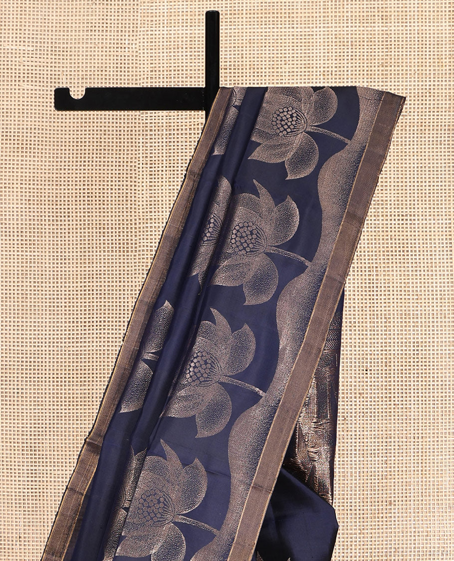 Blue Mayuri Soft Silk Saree, Embellished with Floral Buttas, a Zari Piping Border, Geometric Pallu, and a Matching Blouse