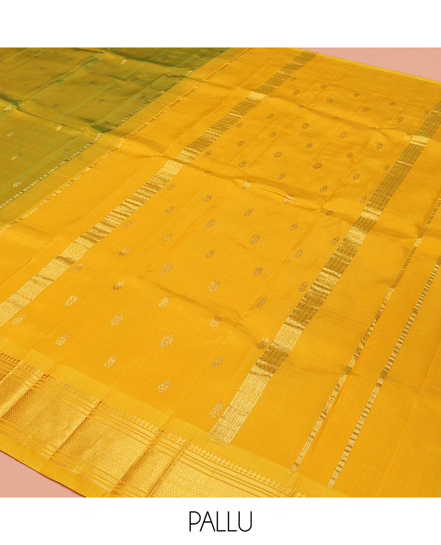 Green Kanchipuram Silk Saree, Woven with Zari Buttas, a Contrast One-Sided Border of Panner Sombu, Banaras, Muthu, and Jaal Design, Zari-Woven Pallu, and No Blouse