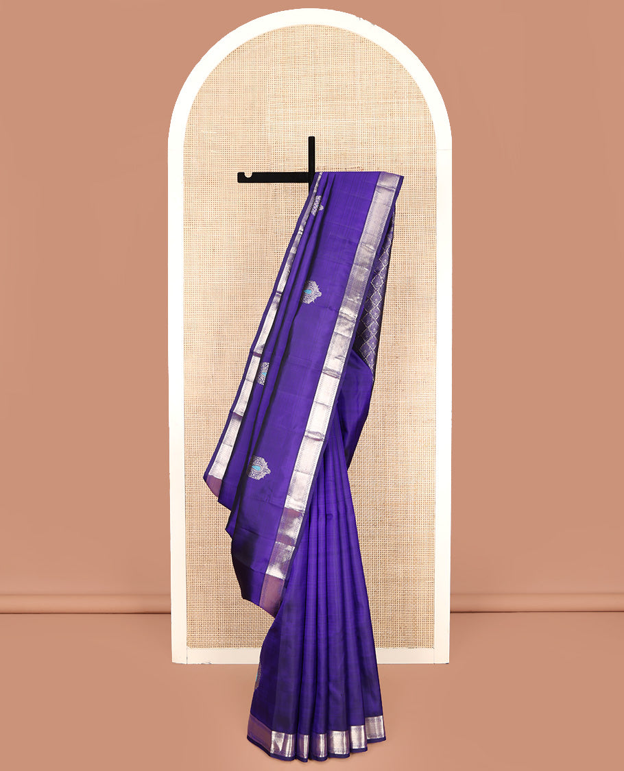 Violet Kanchipuram Silk Saree, Embellished with Zari Buttas All Over Its Body, Highlighted by Zari Border of Muthu and Neli Designs, Grand Pallu, and Paired with a Matching Blouse