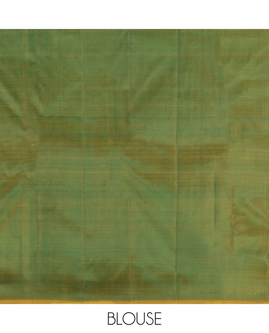Green Kanchipuram Silk Saree, Highlighted by Zari Buttas, a Contrast Thazampoo Rekku Border, Zari Design Pallu, and a Contrast Blouse