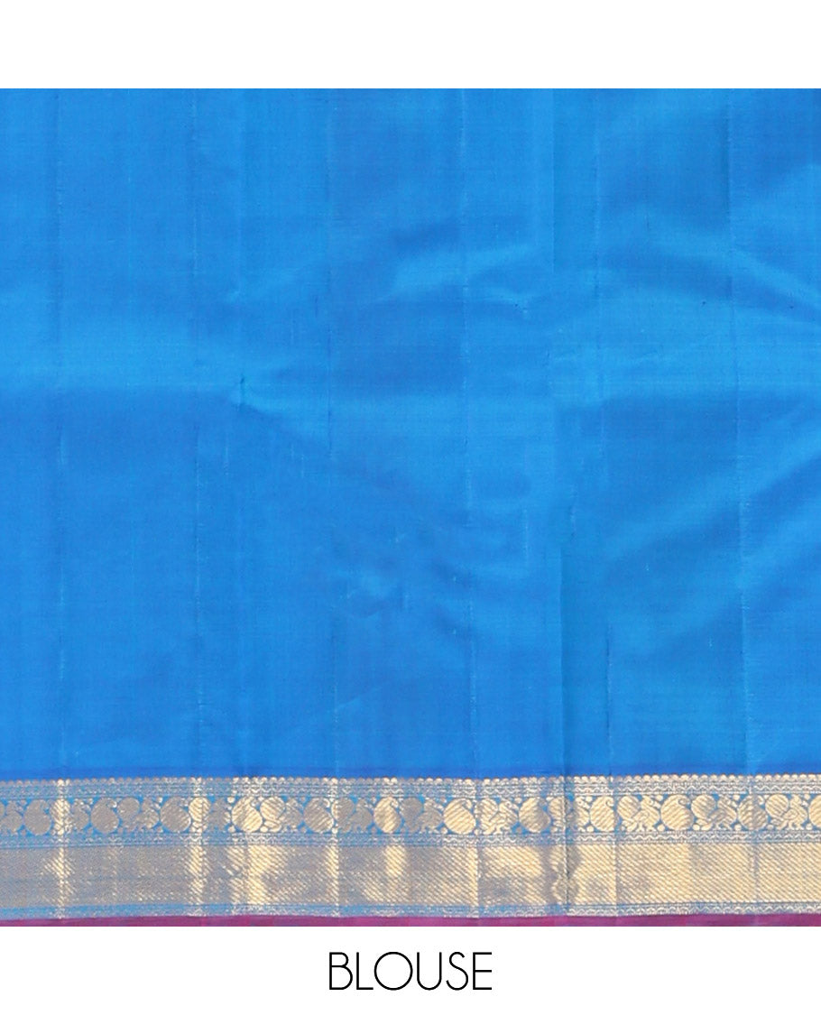 Blue Plain Kanchipuram Silk Saree, Complemented by Contrast Border of Salngai, Muthu, Rekku, Manga, Mayil, and Zari Stripes, Subtly Sparkled Pallu, and Paired with a Contrast Blouse